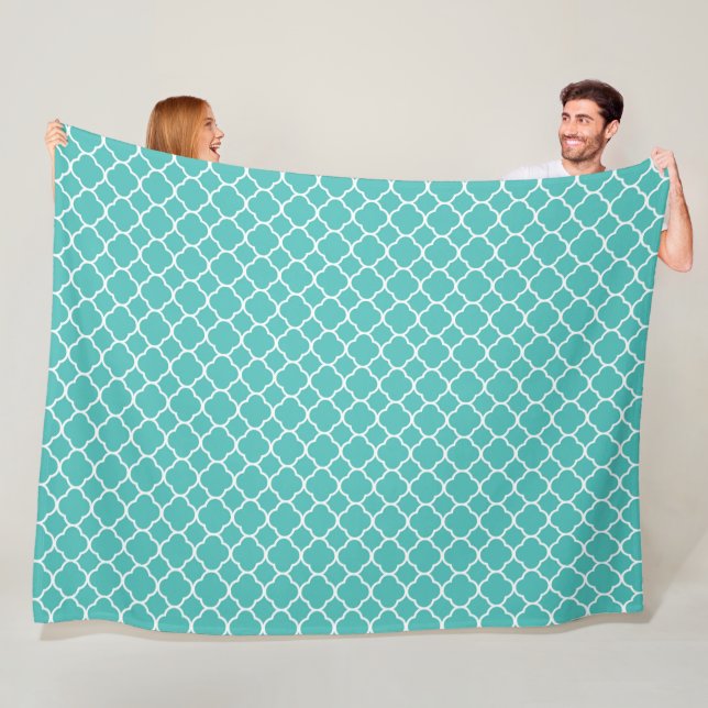 Couverture Polaire Motif à quatre feuilles de couleur sarcelle (En situation)