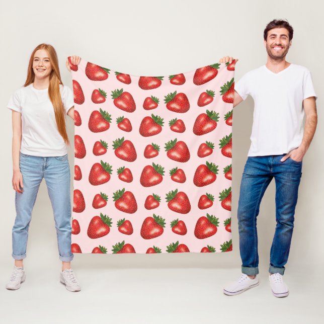 Couverture Polaire Motif de fruits de fraises rouges sur rose (En situation)