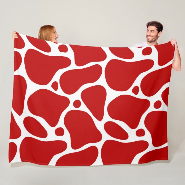 Couverture Polaire Motif de girafe abstraite rouge et blanche (En situation)