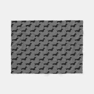 Couverture Polaire Motif d'une chevelure de silhouettes de teckel de
