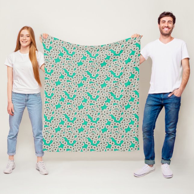 Couverture Polaire Motif floral Art Déco - blanc sur turquoise (En situation)