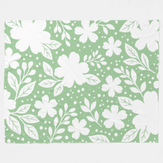 Couverture Polaire Motif floral blanc sur fond vert clair