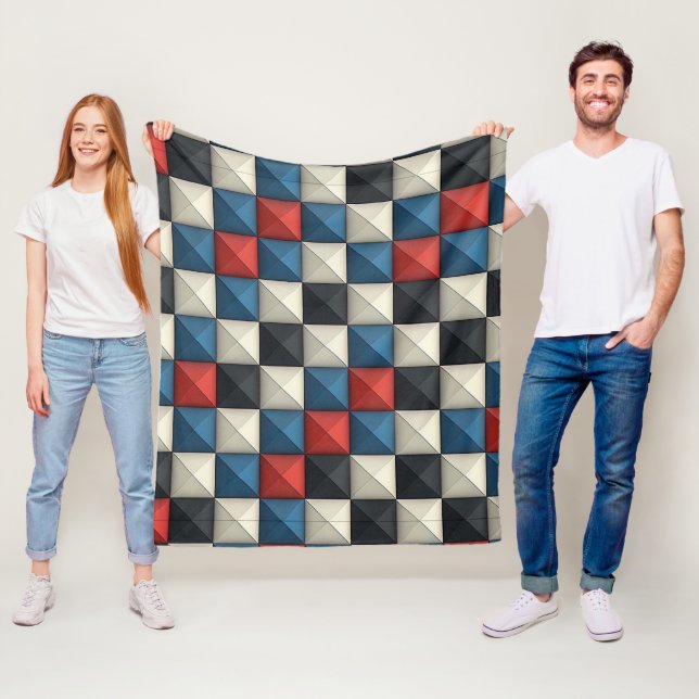 Couverture Polaire Motif géométrique pyramidal 3D – Rouge, Bleu et Cr (En situation)