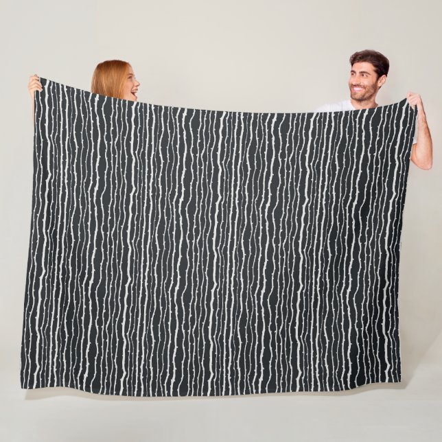 Couverture Polaire motif horizontal à branches noires et blanches (En situation)