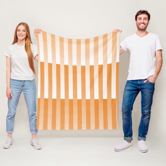 Couverture Polaire Motif rayé orange et blanc (En situation)