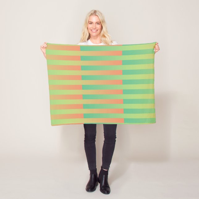 Couverture Polaire Motif rayé vert orange (En situation)