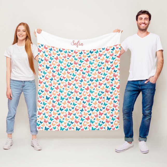 Couverture Polaire Papillon motif turquoise pourpre blanc nom (En situation)