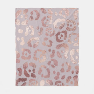 Couverture Polaire Peau léopard : élégance or rose.