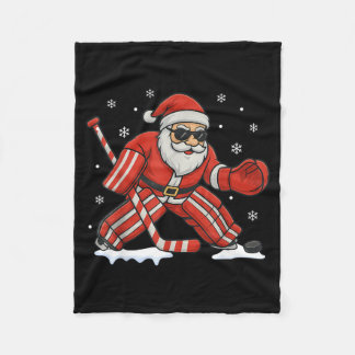 Couverture Polaire Père Noël jouant au gardien de but de hockey sur g
