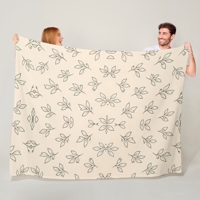 Couverture Polaire Plaid de jet beige à motif de feuille (En situation)