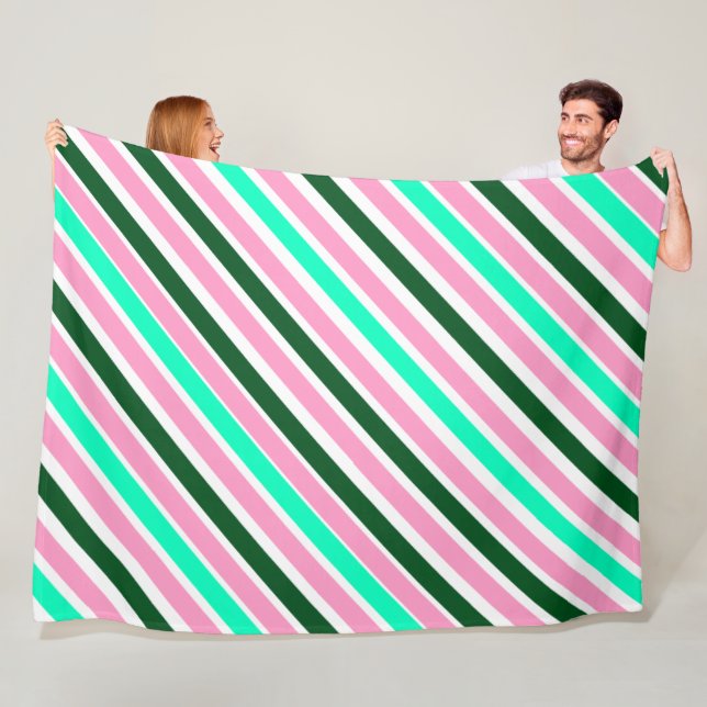 Couverture Polaire Rayures de bonbons de Noël rose et vert  (En situation)