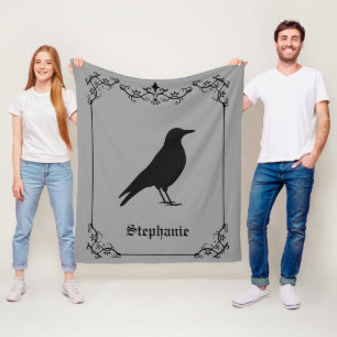 Couverture Polaire Silhouette d'oiseau corbeau et volutes décoratives
