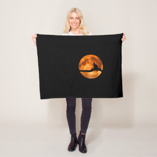 Couverture Polaire Silhouette d'un chat noir dans un arbre