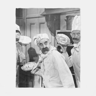 Couverture Polaire Trois chefs tenant des tartes pour une bagarre dan