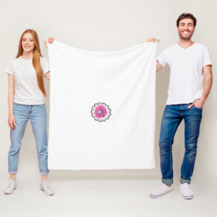 Couverture Polaire une fleur rose avec un centre bleu sur un fond bla