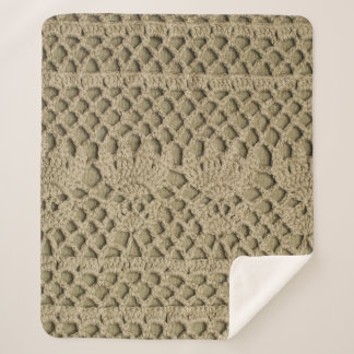 Couverture Sherpa Dentelle artisanale vert olive sur arrière - plan