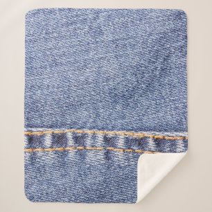 Couverture Sherpa Le jean bleu coudre la texture du closeup. 