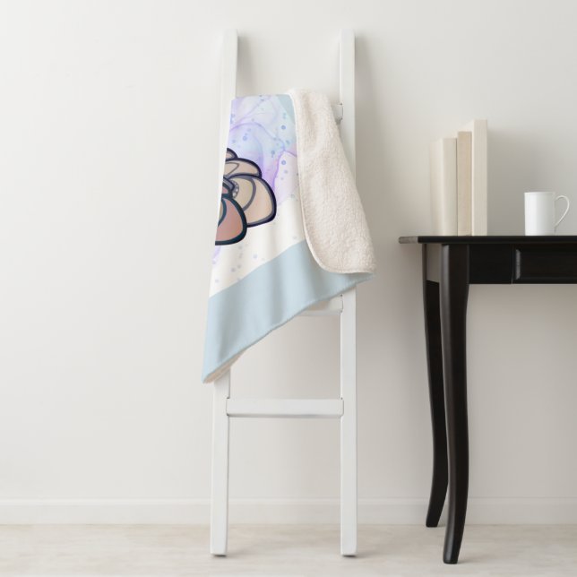 Couverture Sherpa Manta Sherpa calda e avvolgente. (En situation)