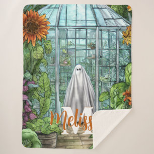 Couverture Sherpa Monogramme fantôme dans la serre