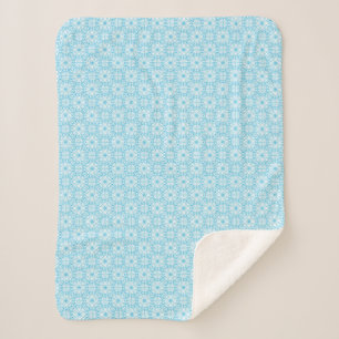 Couverture Sherpa Motif de symétrie géométrique bleu clair