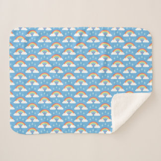 Couverture Sherpa Nuages de pluie arc-en-ciel sur bleu