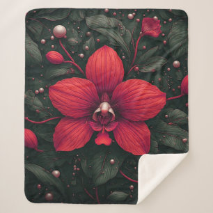Couverture Sherpa Orchidée rouge en fleurs avec des feuilles vertes
