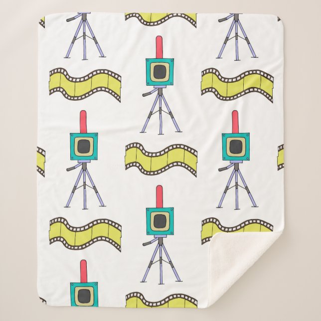 Couverture Sherpa Seamless pattern with cameras and film strips on a (Devant)