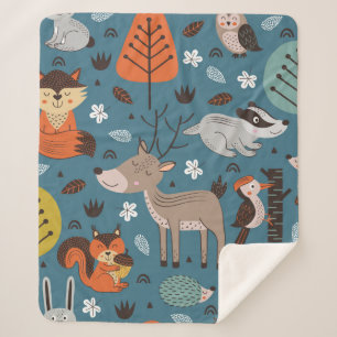 Couverture Sherpa Seamless pattern with forest animals on blue backg