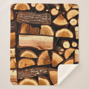 Couverture Sherpa Texture. Pile de bois de feu haché stocké, hiver