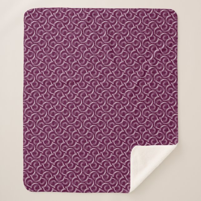 Couverture Sherpa White ornament on a burgundy background. (Devant)
