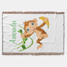 Singe mignon avec la banane