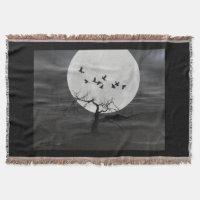Spooky Ravens Flying Against the Full Moon