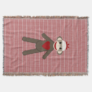 couverture tissée par singe de chaussette sur le