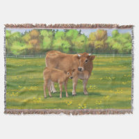 Vache d'Aubrac et veau mignon dans le pâturage de
