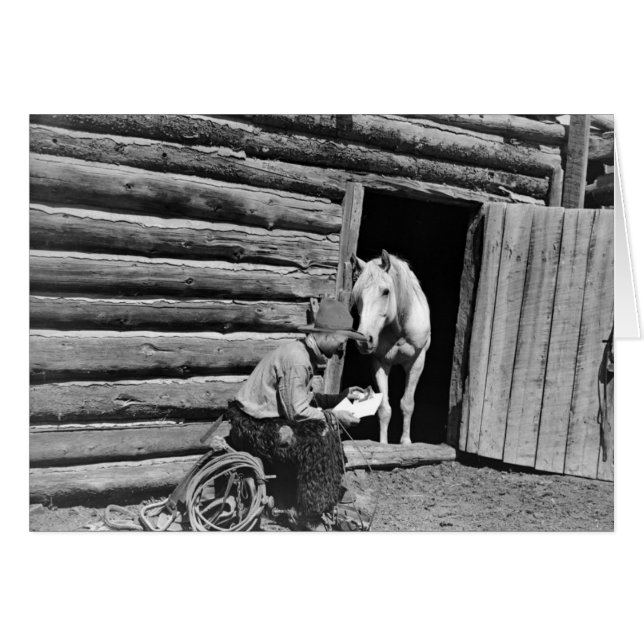 Cowboy et un cheval regardant une lettre (Devant horizontal)