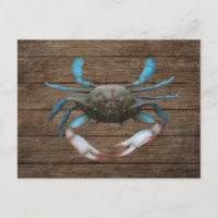 Crabe bleu sur carte postale en bois