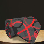 Cravate Abstrait Brosse rouge gris noir<br><div class="desc">Cette cravate allie élégance et modernité. La couleur de base est une couleur foncée, riche, qui sert de toile de fond aux motifs géométriques rouges et noirs qui l'embellissent. Le design présente des formes circulaires entrelacées de lignes angulaires, créant une interaction visuelle captivante. Les lignes angulaires qui intersectent et entourent...</div>