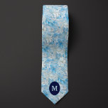 Cravate Bleu de glace Botanique d'hiver<br><div class="desc">Élevez votre tenue de mariage d'hiver avec notre Cravate botanique d'hiver bleu glace. La motif botanique en bleu glacé apporte une touche d'élégance et de style. N'oubliez pas de coordonner avec nos chaussettes assorties pour un look poli.</div>