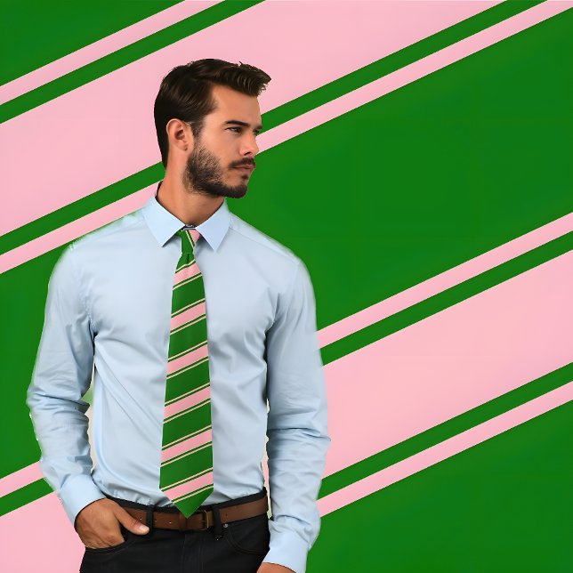 Cravate de bandes diagonales minces et épaisses ro (Man wearing Pink & Green Thick and Thin Diagonal Stripes Tie. He stands against patterned background)