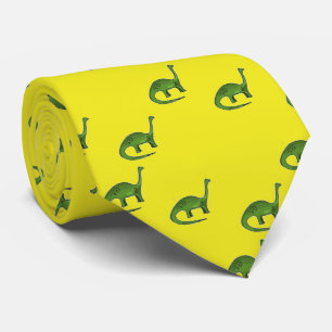 Cravate Dinosaures verts sur motif jaune