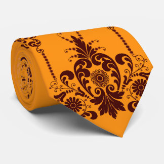 Cravate fleurs orange et impression de volutes