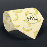 Cravate Funny Banana Jaune Illustration Monogramme Nouveau<br><div class="desc">Ce motif de banane jaune amusant et fruité a été créé à l'aide de mon illustration de banane mixte peinte à la main et fait un design original pour ceux qui ne prennent pas la vie, ou leurs chaussettes trop au sérieux! Le ton tamisé sur le ton donne une impression...</div>