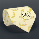 Cravate Funny Banana Jaune Illustration Monogramme Nouveau<br><div class="desc">Ce motif de banane jaune amusant et fruité a été créé à l'aide de mon illustration de banane mixte peinte à la main et fait un design original pour ceux qui ne prennent pas la vie, ou leurs chaussettes trop au sérieux! Le ton tamisé sur le ton donne une impression...</div>