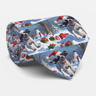 Cravate Griffon à poil dur avec un chapeau de Noël enneigé