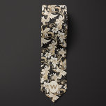 Cravate Monogramme noir, blanc et blanc<br><div class="desc">Optez pour une esthétique classique avec notre Cravate Monogramme Noir,  Blanc et Taupe. La palette de couleurs sophistiquée et le design botanique en font un choix polyvalent pour les mariages. Complétez votre ensemble avec nos chaussettes assorties pour un look coordonné.</div>