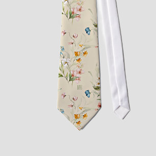 Cravate Monogramme sur une nature morte florale colorée Be