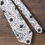 Cravate Motif floral botanique noir blanc<br><div class="desc">Ajoutez une touche de sophistication à votre tenue avec cette cravate élégante, dotée d'un beau motif floral botanique noir et blanc. Conçue pour être fleurie sans être trop féminine, cette cravate trouve le parfait équilibre entre élégance et subtilité. Le motif, rappelant les marques de mode françaises haut de gamme, ajoute...</div>