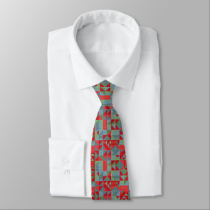 Cravate Motif géométrique rouge, gris et vert.