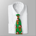 Cravate Noël de mignon Dachshund Père Noël Wiener Chien<br><div class="desc">Ajoutez un peu de gaieté de vacances à votre garde-robe avec ce cravate vert festif avec un imprimé en permanence d'un adorable dachshund portant un chapeau de Père Noël. Que vous soyez à la fête de Noël au bureau ou à un événement de vacances plus formel, ce cravate unique et...</div>