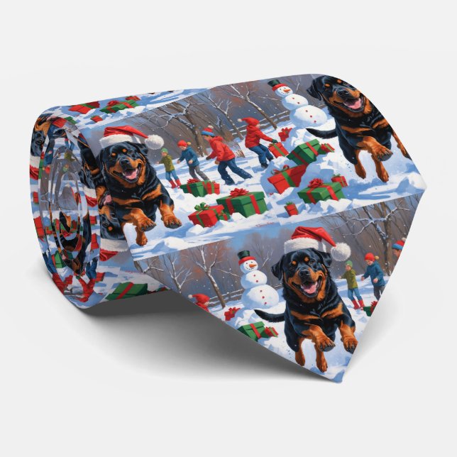 Cravate Rottweiler courant dans la neige avec un chapeau d (Roulé)